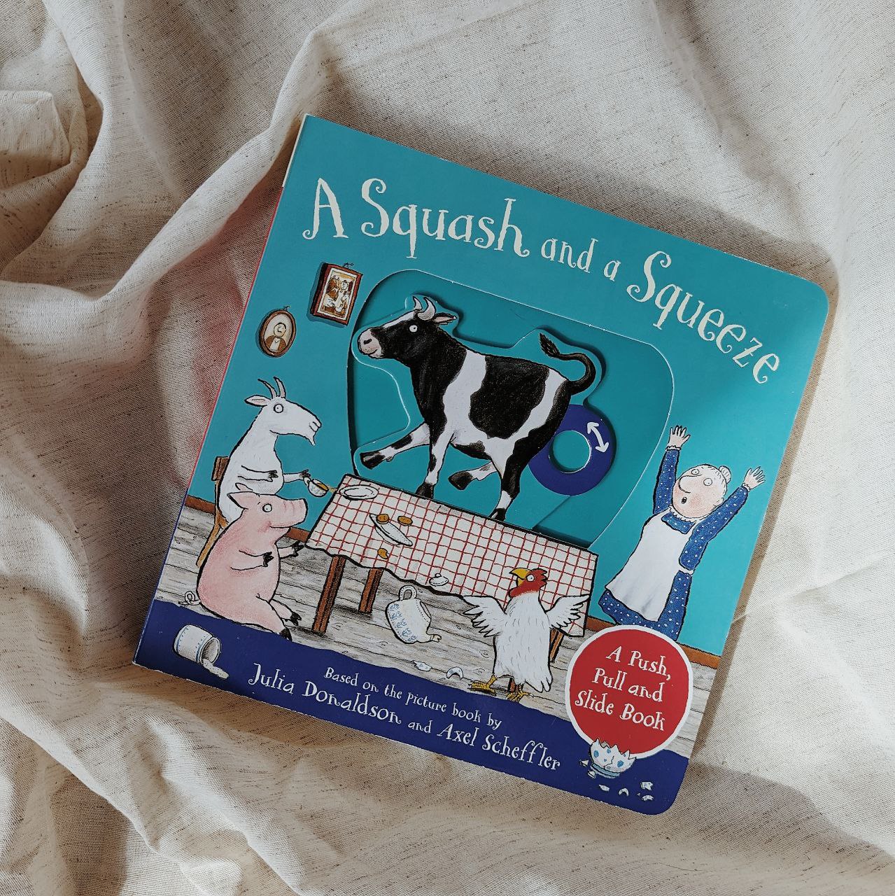 A Squash and a Squeeze: A Push, Pull and Slide Book by Julia Donaldson